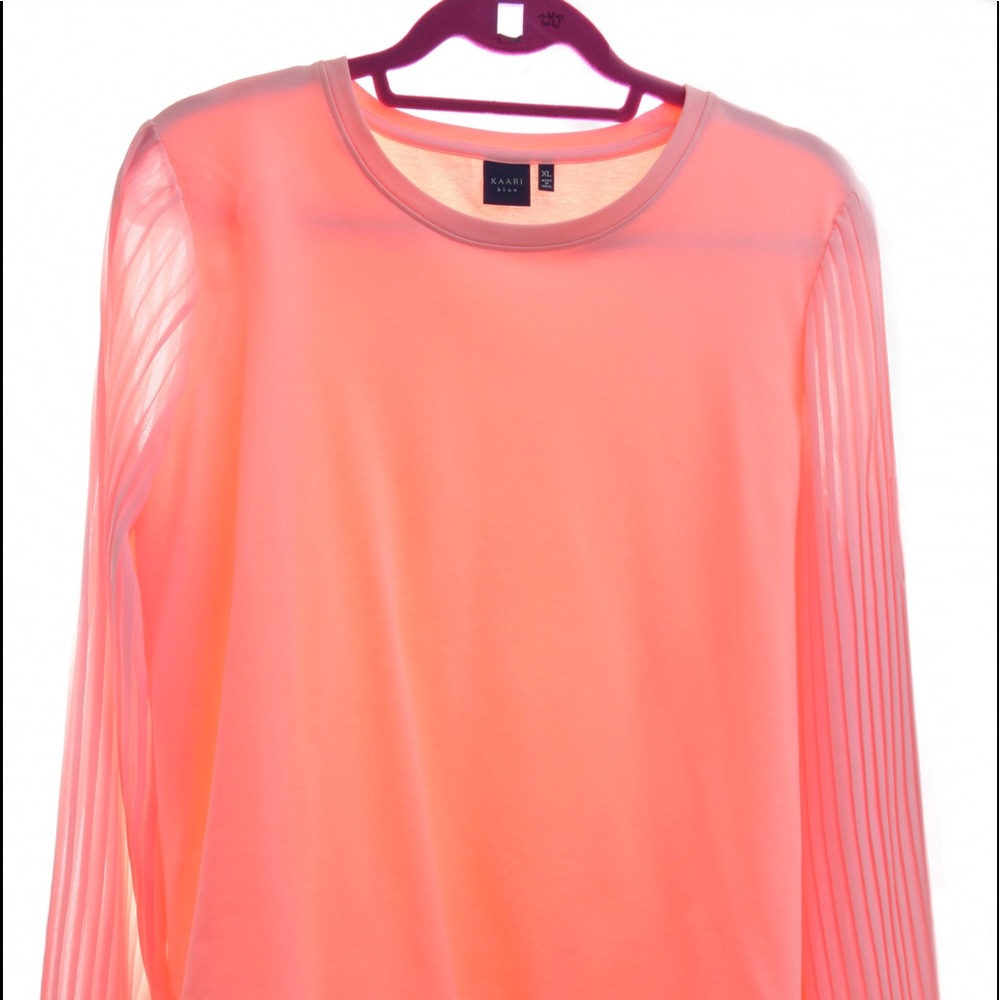 Peach pleated sleeve top.